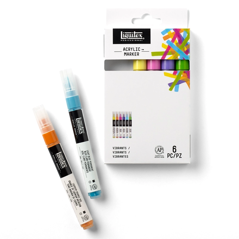 Komplet mazaków akrylowych Liquitex Acrylic Marker Classics na białym tle, z leżącymi obok dwoma markerami z zestawu.